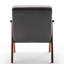 Fauteuil d'appoint en velours gris avec structure en bois, pour une ambiance accueillante. Construction robuste, s'intègre parfaitement dans une entrée.