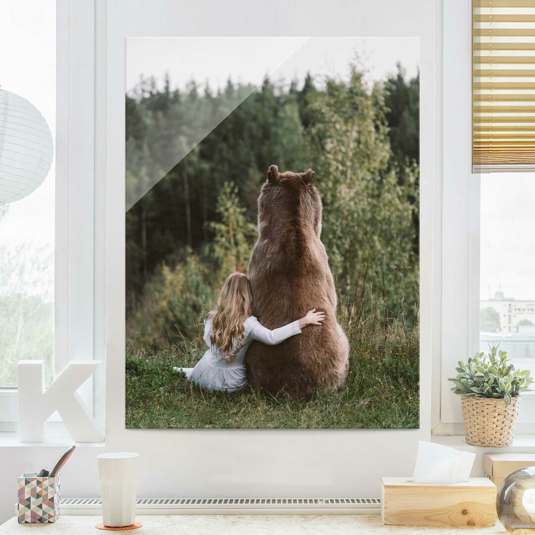 Glasbild Mädchen mit Braunbär