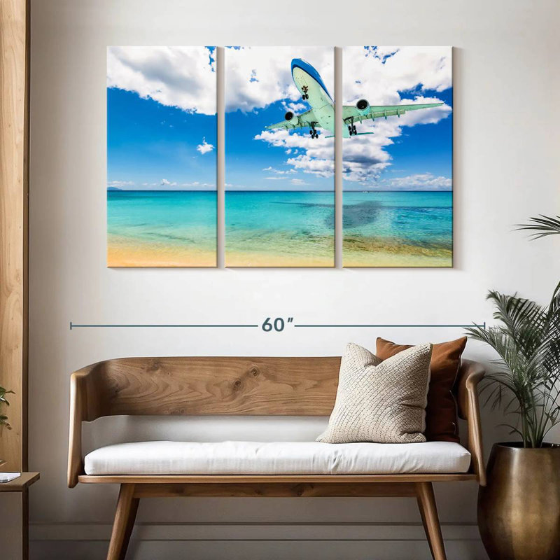 Avion au-dessus de la plage, H 32 po x l 50 po