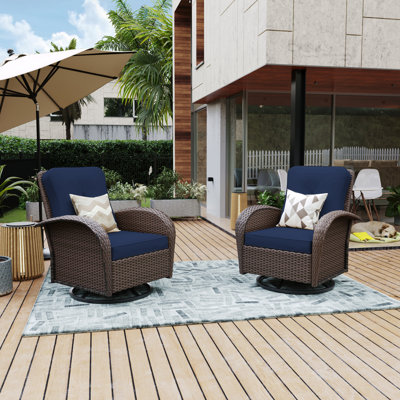 Chaise berçante d'extérieur en osier avec coussins Numenius