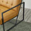 Fauteuil et repose-pieds en cuir Buren-101040977