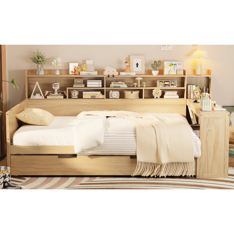 Lit de jour en bois naturel avec beaucoup de rangement, lit gigogne simple et espace d'étude productif en teintes de bois, tablettes, bureau, finition