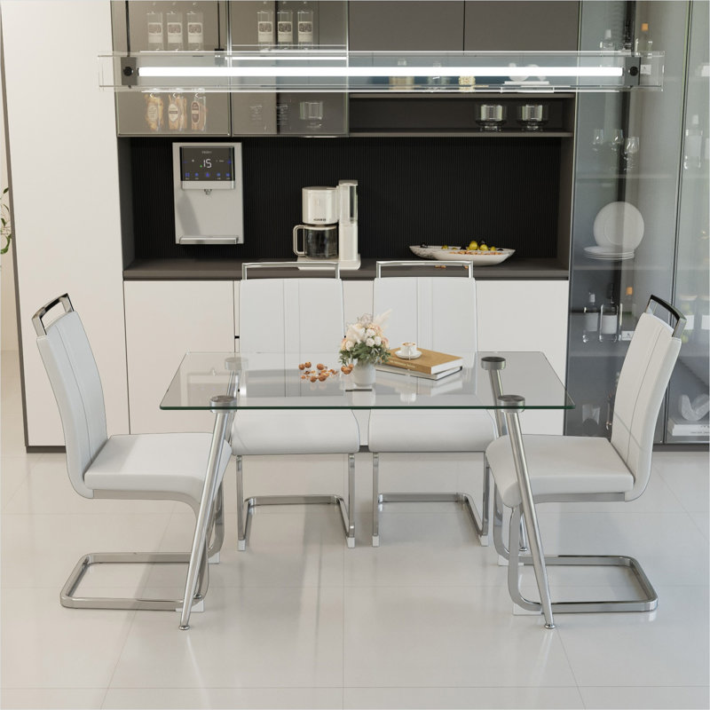 Ensemble de salle à manger 4 personnes en verre transparent avec pieds argentés, table rectangulaire moderne