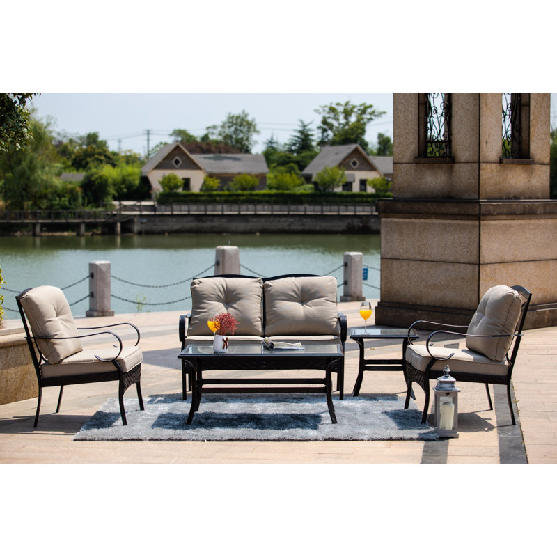 Bacote 4 - Person Wicker Patio Dining Set with Rectangular Table