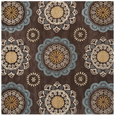 Kouerga Hand Tufted Wool/Cotton Floral Rug in Beige/Brown/Blue