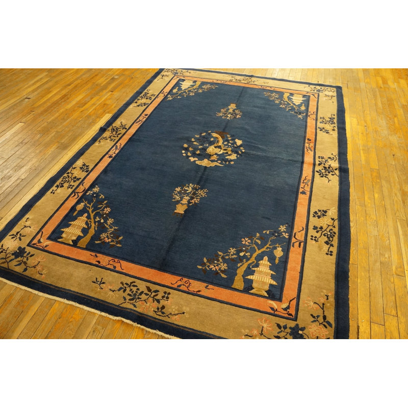 Tapis bleu antique à motif de médaillon floral