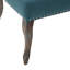 Élégant fauteuil à oreilles bleu sarcelle avec pieds et capitonnage