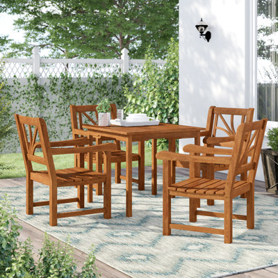 Annekatrin 4 - Person Eucalyptus Solid Wood Patio Dining Set Umbrella Hole Included Square Table