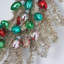 Couronne de Noël Razzle Dazzle - guirlande dorée et argentée avec ampoules rétro en rose, turquoise, vert et rouge