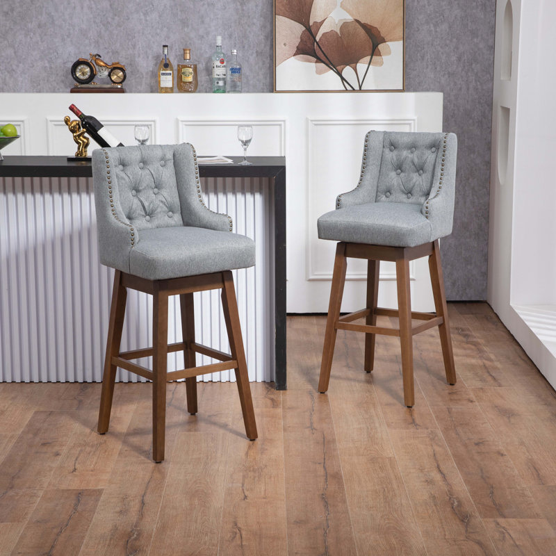 Tabouret de comptoir pivotant avec cadre en bois massif 29,9 po Luthando, Gris