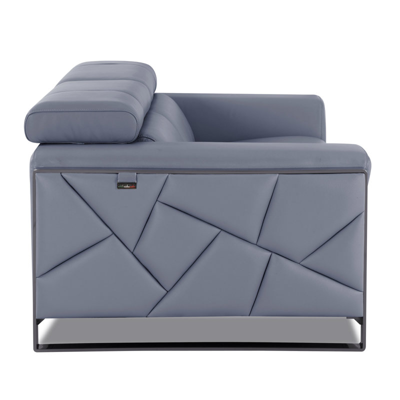 Causeuse en cuir italien Global United. Pieds en acier inoxydable chromé