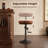 Jeptha Swivel Upholstered Adjustable Height Counter Stool with Iron Frame