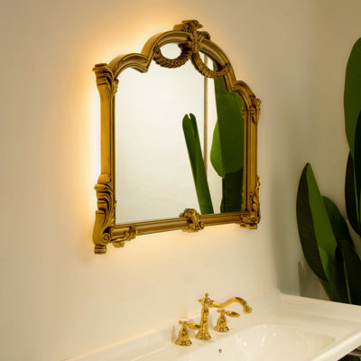 Miroir, miroir pu de style baroque avec un cadre doré orné