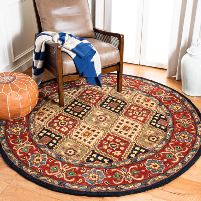 Dipietro Hand Loomed Wool/Cotton/Latex Oriental Rug in Red/Beige