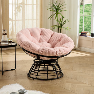 Confortable fauteuil pivotant 360 avec coussin rose épais, structure en acier brun et style contemporain, pour la finition thermolaquée douce de la chambre à coucher, salle de lecture