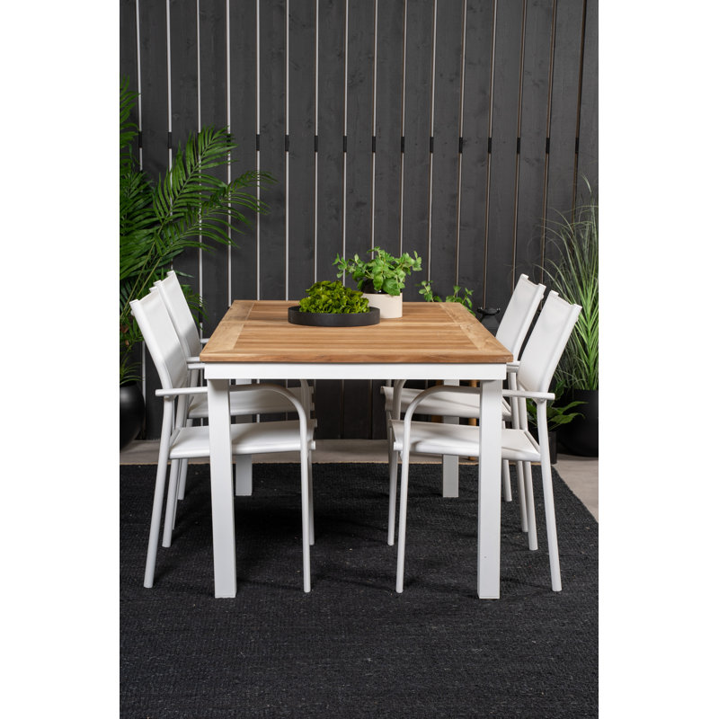 Navya 4 - Person Teak Solid Wood Patio Dining Set Extendable Rectangular Table