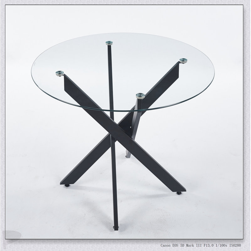 Table de salle à manger moderne noire avec plateau en verre trempé et pieds croisés en métal, parfaite pour économiser de l'espace dans les salons
