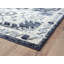 Tapis bleu à motif géométrique-373548749