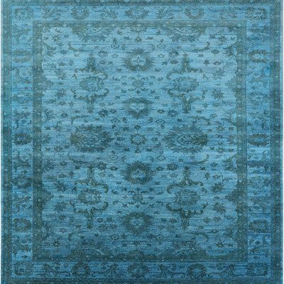 Tapis bleu sarcelle à motif oriental