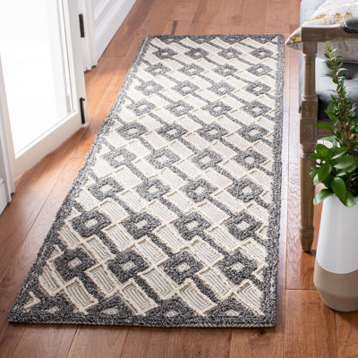 Tapis géométrique touffeté à la main Owlswick