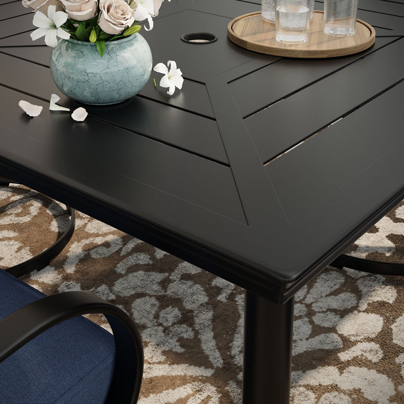 Keaney 4 - Person Patio Dining Set with Square Table , Cushions Included, Navy Blue