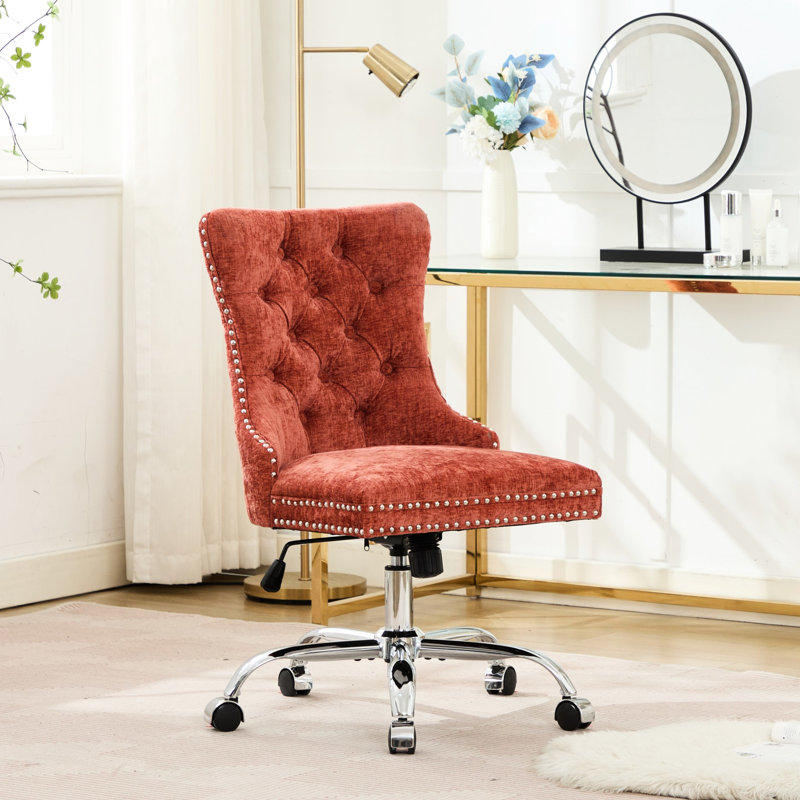 Chaise de bureau orange moderne, revêtement en chenille avec boutons, base en métal, pivot réglable, coussin à rebond élevé, garniture cloutée décorative tirée à la main, confortable pour étude en éponge