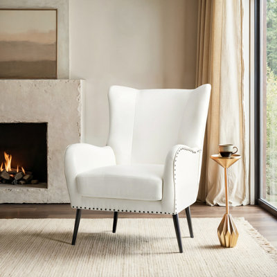 Fauteuil à oreilles en similicuir avec garniture cloutée 30 po Ebbert