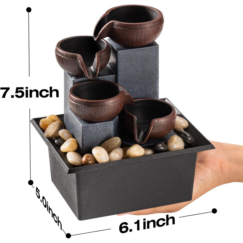 Tabletop fountain 4-tier cascade fountain includes LED colored lighting and natural rocks