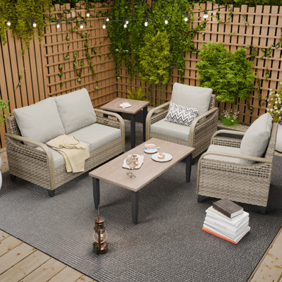 Mellon Wicker 4 - Person Patio Conversation Set with Cushions