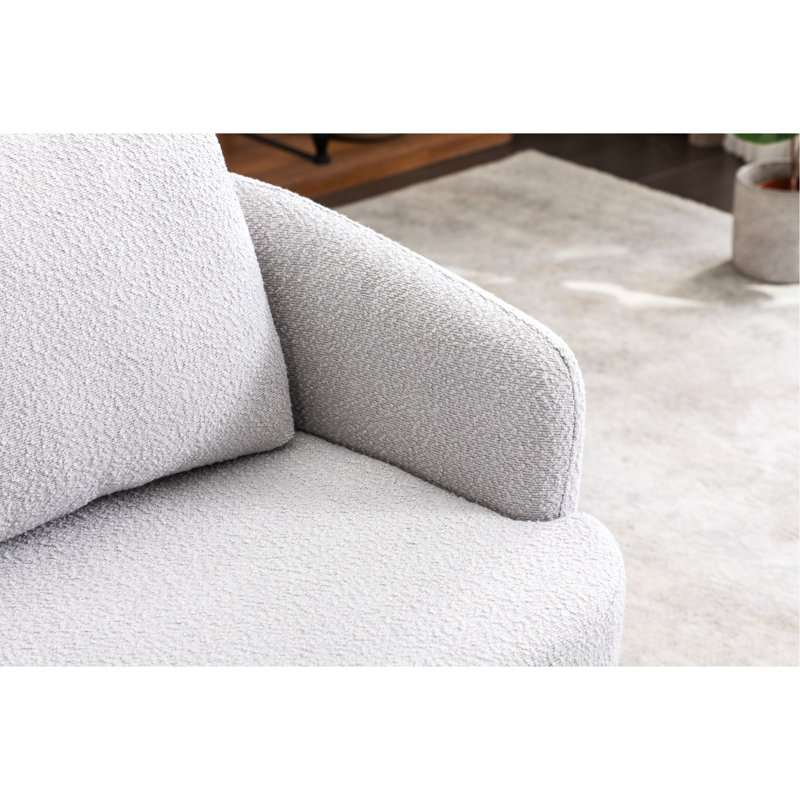 Chaise en tissu bouclé gris de style moderne avec coussin de dossier en coton et base en bois massif brun pour le salon