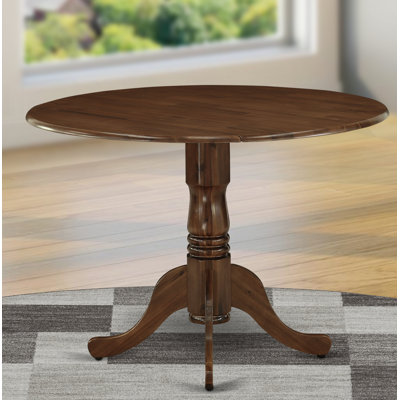 Silvas Extendable Round Solid Wood Dining Table
