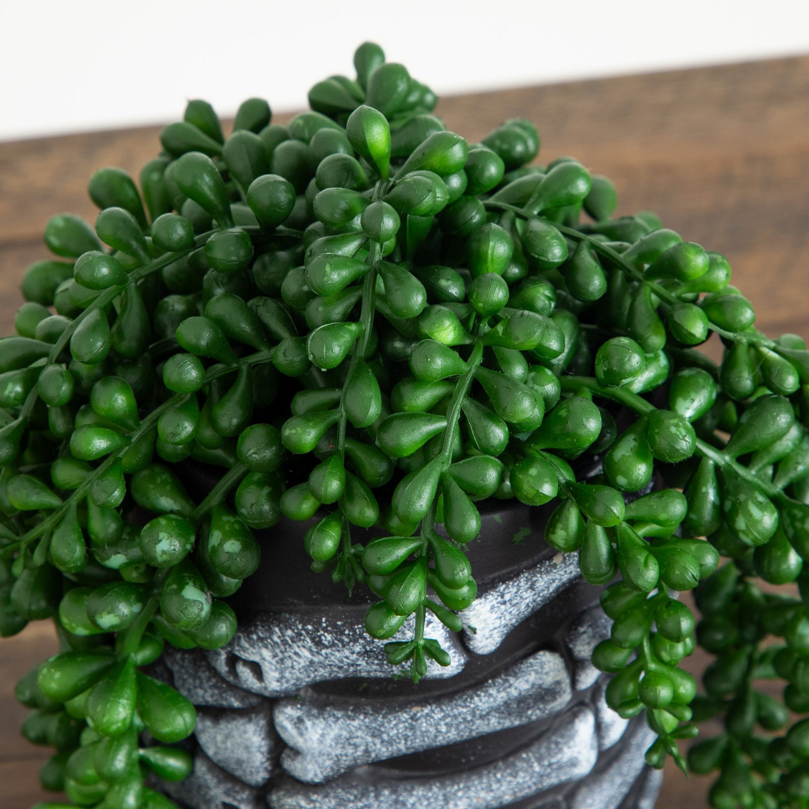 7in. Artificial Halloween String of Pearls in Skeleton Hand Planter