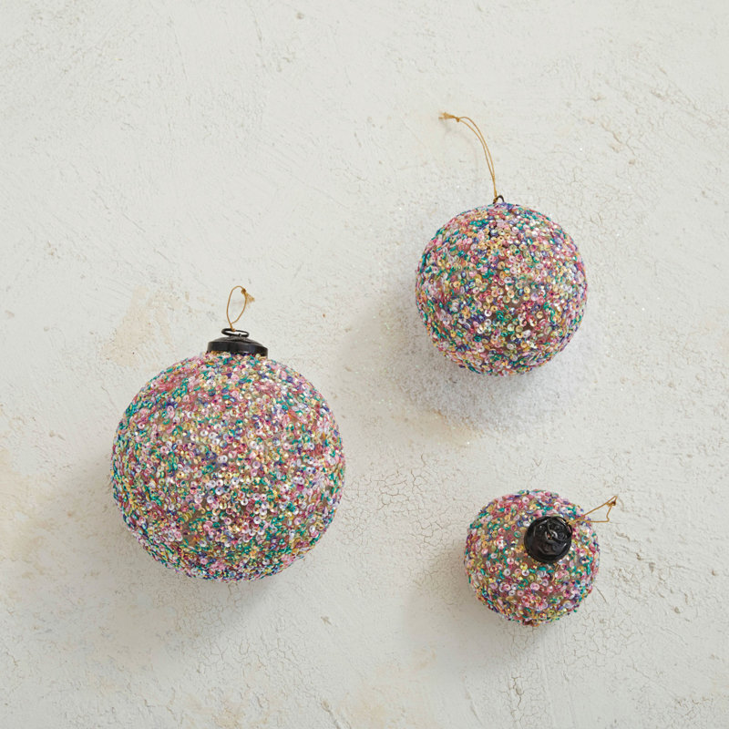 Ornement boule de verre avec paillettes
