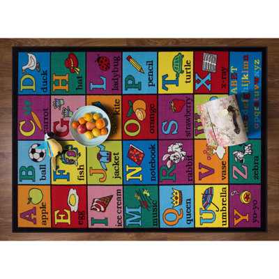 Jeromy Tufted Kids Purple/Blue/Orange Multi-Colored Non-Slip Rubberback Area Rug