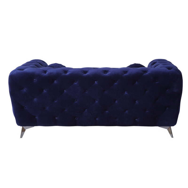 Causeuse en velours bleu