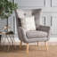 Fauteuil à oreilles en polyester capitonné Buchholz-626036764