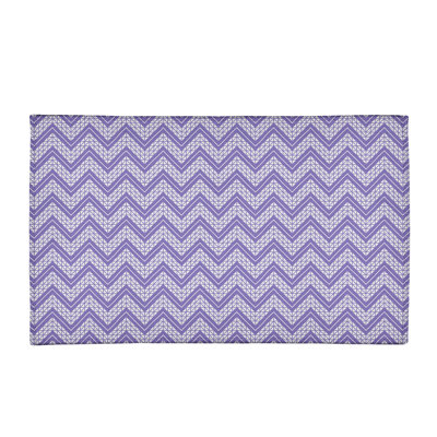 Tapis mauve/gris à cadre à main