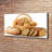 Bread In A Basket - Wrapped Canvas Print