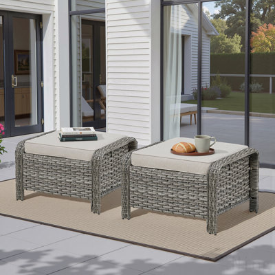 Ensemble de 2 repose-pieds d'extérieur en rotin gris avec coussin beige pour patio ou terrasse