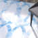 Amekia Hand Tufted Wool/Cotton Geometric Rug in Blue/Ivory