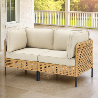 Canapé d'angle extérieur naturel avec coussins beiges, résistant aux intempéries, coussins amovibles pour plus de confort et de détente, style modulaire pour jardins