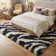 Tapis à motif imprimé animal noir Dondre