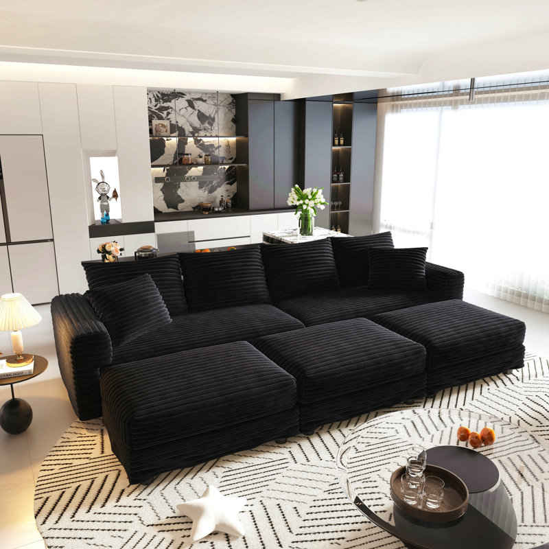 Canapé moderne convertible à 4 places avec coussins moelleux et repose-pieds mobiles, offrant un confort et une polyvalence ultimes pour se détendre à la maison
