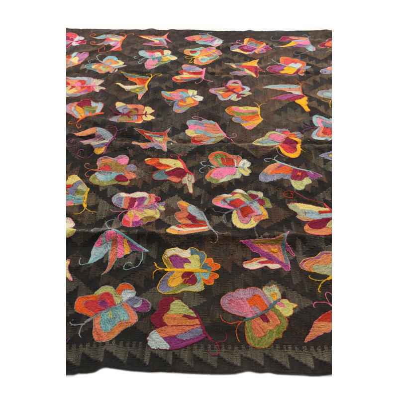 Tapis brun foncé Pelfrey