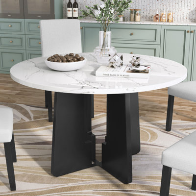 Table de salle à manger ronde avec base robuste