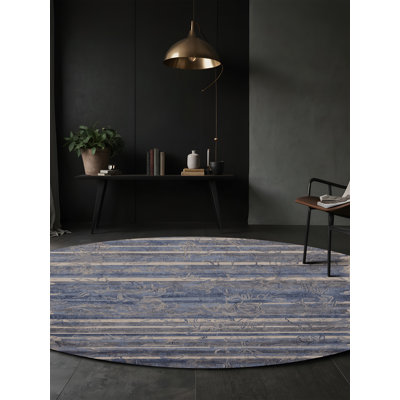 Tapis gris soyeux et moelleux