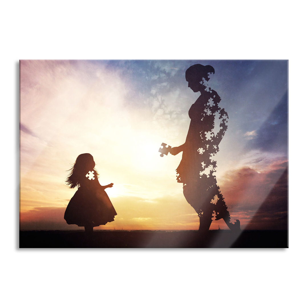 Glasbild Silhouette Puzzle Mutter und Kind