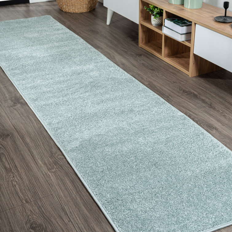 Tapis bleu uni à poils courts Arzel