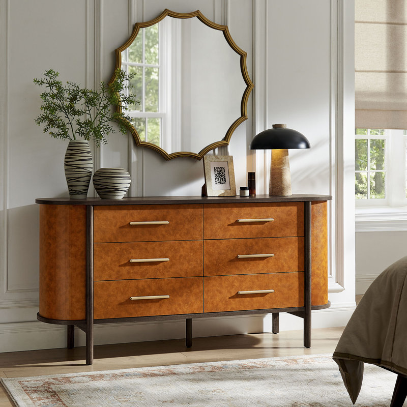 Commode ovale courbée en cuir vegan à 6 tiroirs Coralie