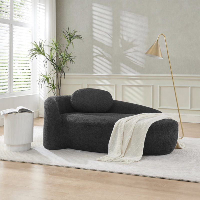 Fauteuil paresseux moderne simple ovale avec dossier intégré, accoudoirs latéraux et coussin, chaise longue compacte peu encombrante pour le salon - noir